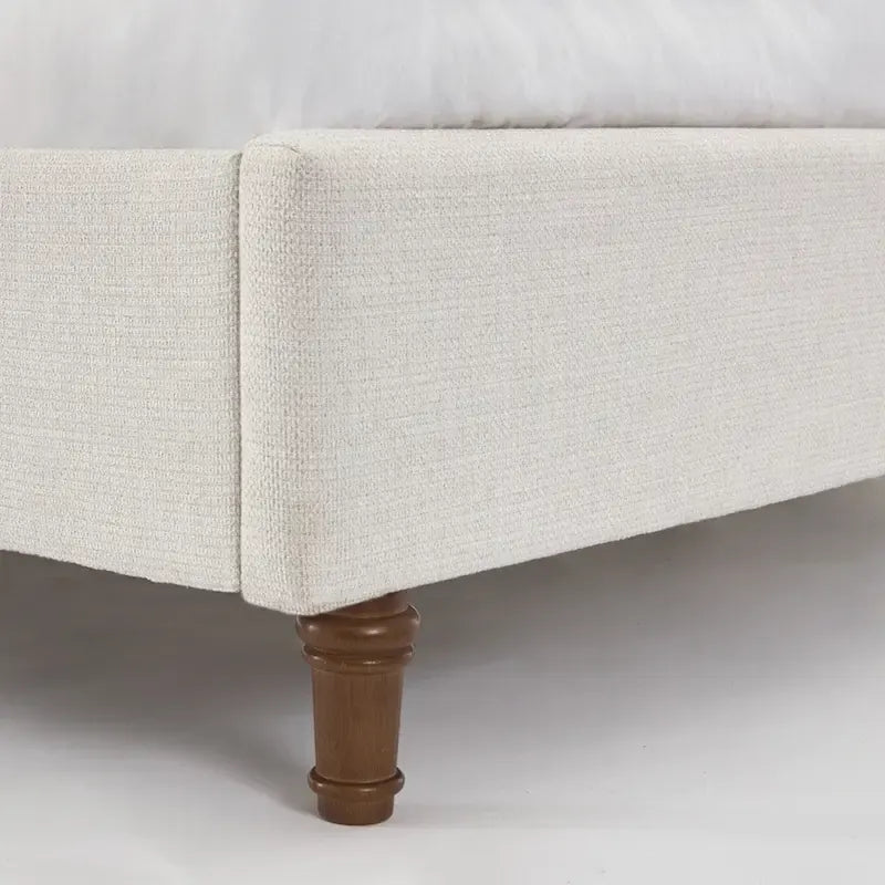 Lit rembourré avec tête de lit haute, style élégant et épuré